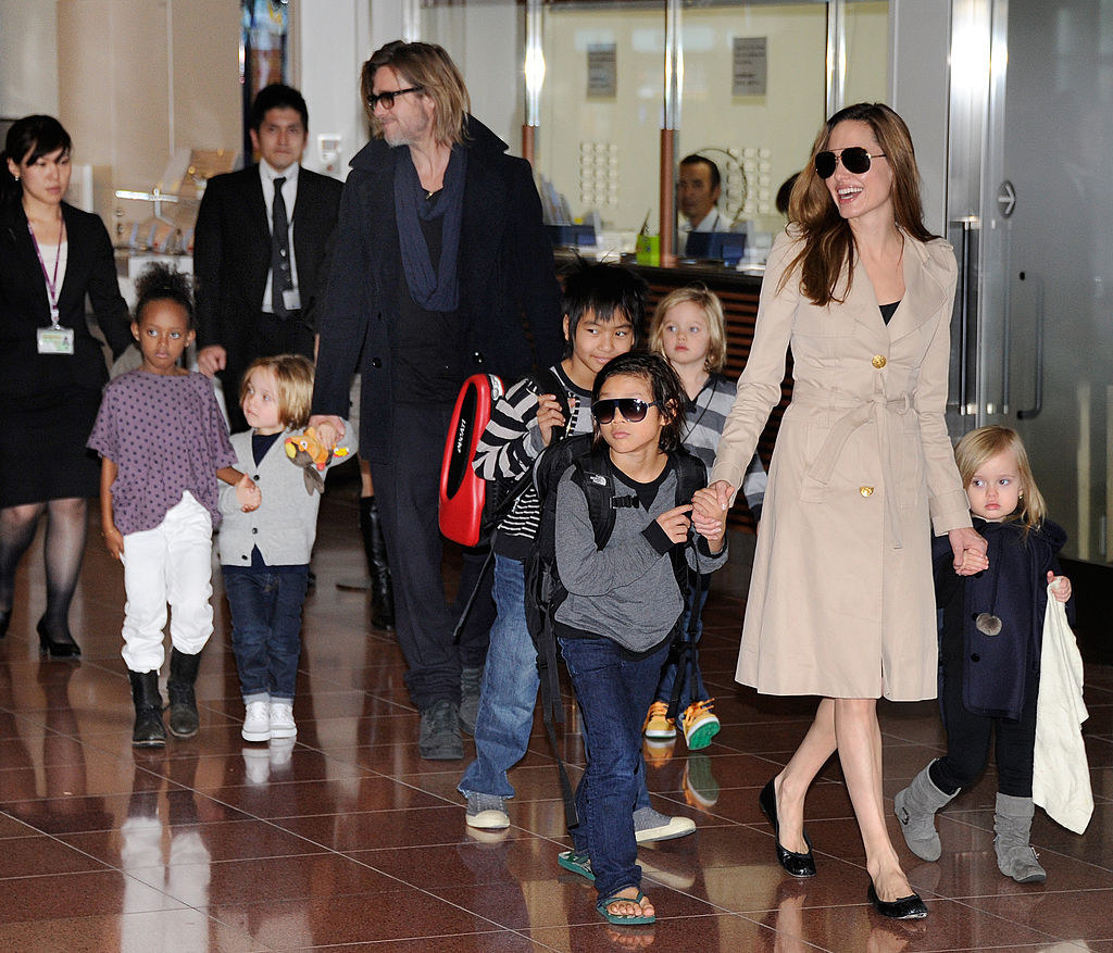 Angelina Jolie's Skinny Waxed, Non-Mom Jeans Are Perfect for Travel (and  Extra Pics of Brad and the Kids Too!)