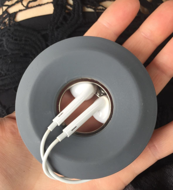 Promising review: "I really, really love this little cable ring thing! My headphones were always such a pain to untangle at the gym. Now, I keep them in this holder and clipped to my water bottle, so I can grab both as I'm getting out of the car and be on the treadmill with my music on in no time!" —Michelle Get it from Amazon for $9.95 (available in three colors).