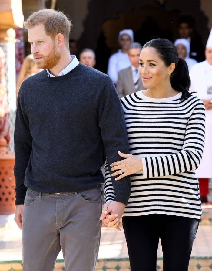Harry and Meghan walk hand in hand