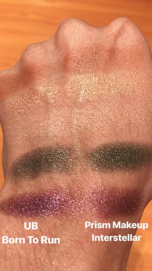 Reviewer swatching the Interstellar palette and comparing it to the Urban Decay Born to Run palette. The colors are very similar.