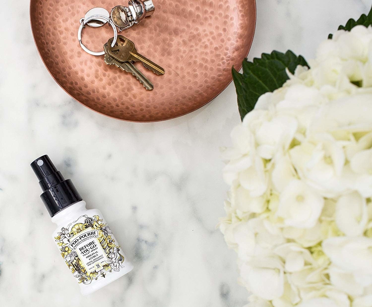 poo-pouri bottle on a table