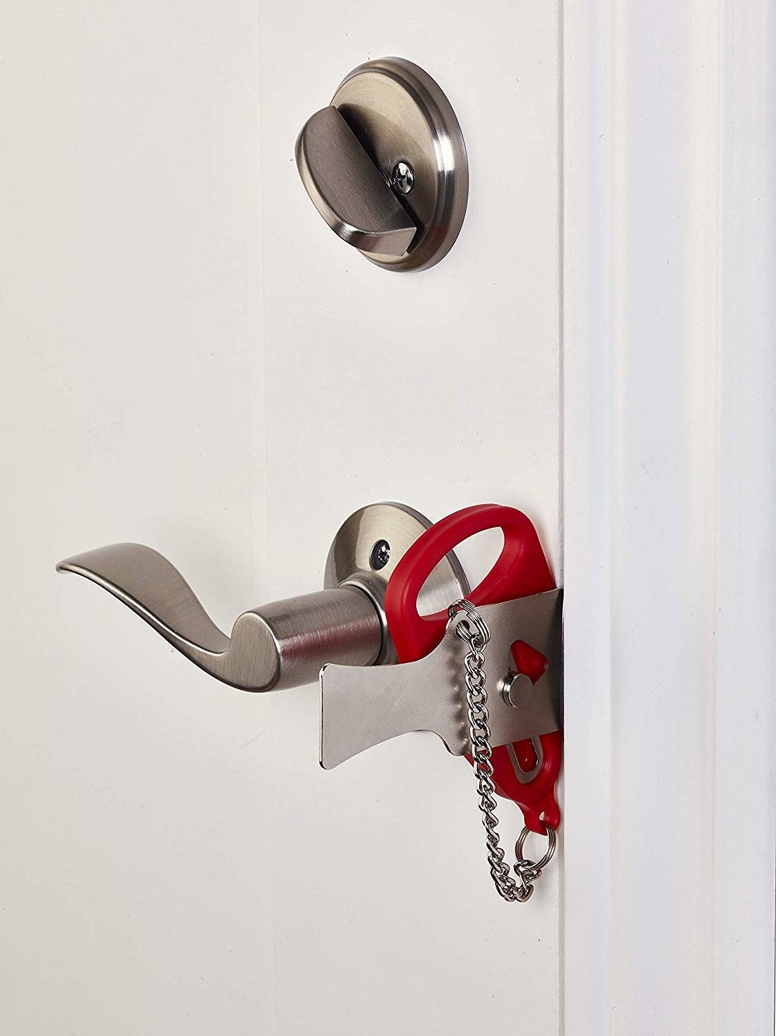 the portable door lock attached to a door