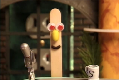 Photo of Stick Stickly at his desk