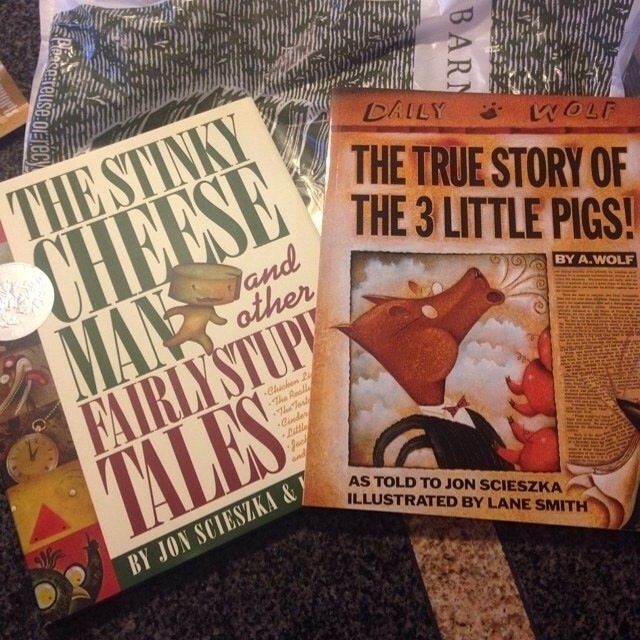 Two books on a table: The Stinky Cheese Man and The True Story of the 3 Little Pigs!