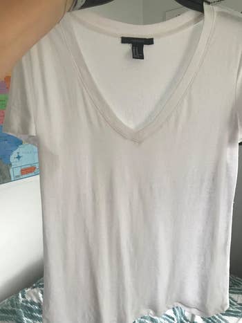 same reviewer's shirt without the wrinkles after using the spray
