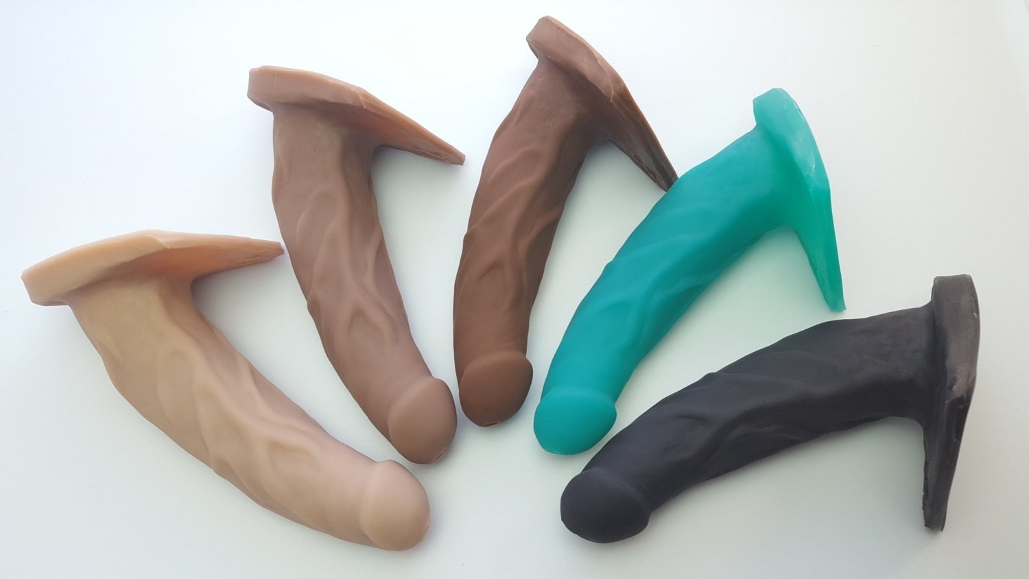 five different colored BJ toys