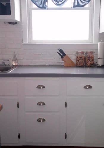 A reviewer's kitchen showing their drawers with the half-dome handles