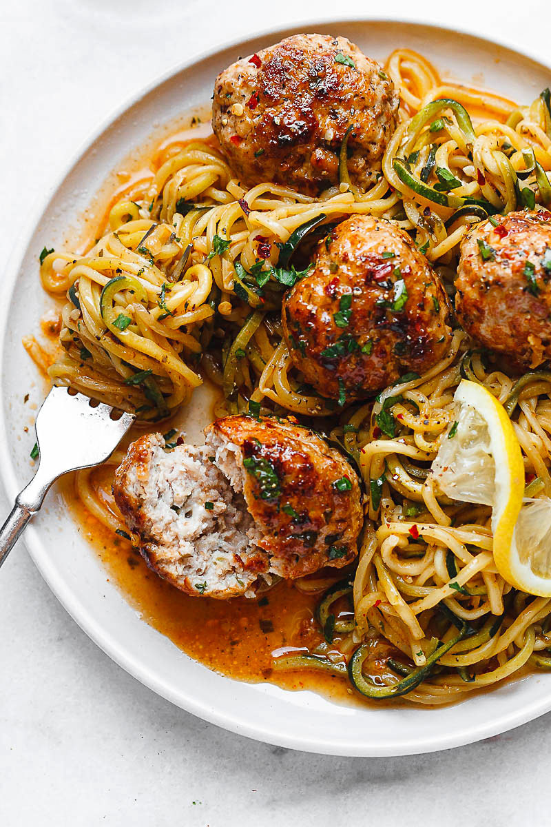 Who needs spaghetti and meatballs when you can have zucchini noodles and turkey meatballs tossed in a savory garlic butter? Get the recipe.