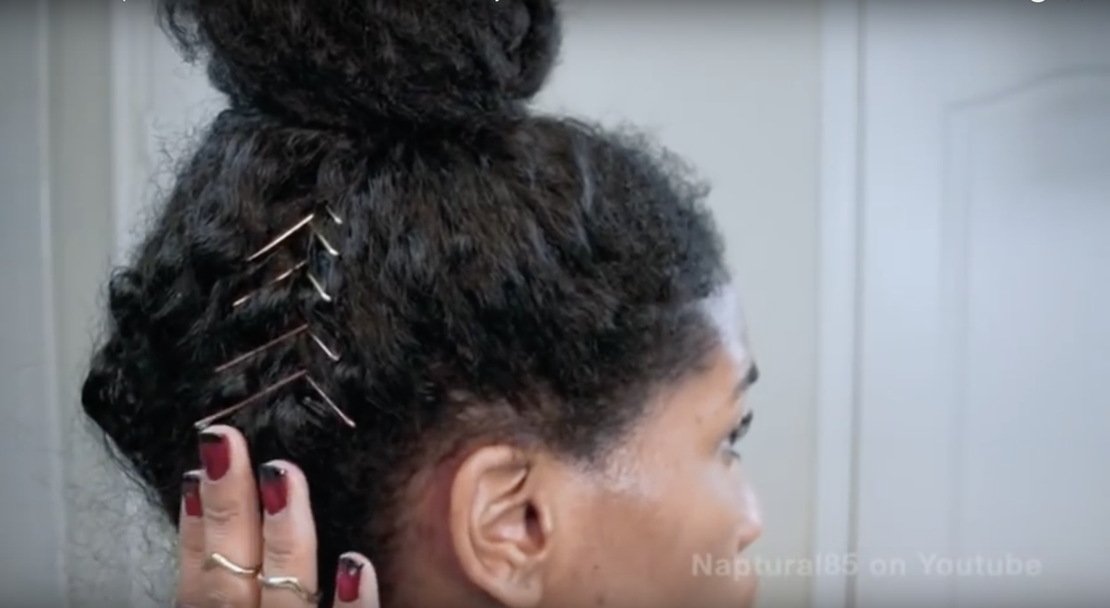 A screenshot form the video of bobby pins forming a chevron shape