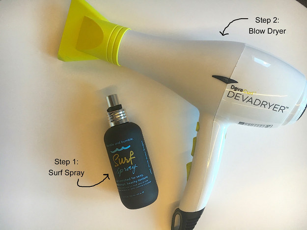 The spray next to a blow dryer