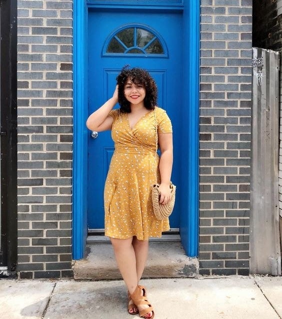 Reviewer wearing the short-sleeve dress in yellow 