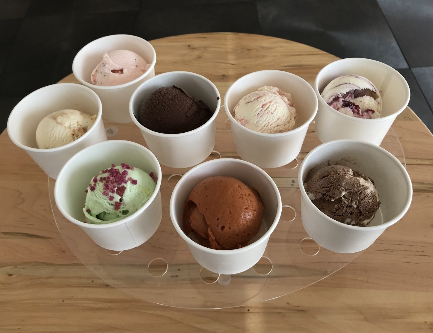 Top Row (L–R): Crème of the Poppy, Dragon Glace, Candied Plums, Children of the Forest Fruits.Bottom Row (L–R): Winter is Here, Growing Strong, A Flavor of Ice + Fire, Dothrocky Road.