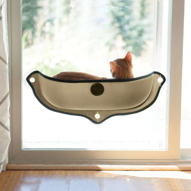 Promising review: "My cat George was scared at first to enter the window bed but now he loves it. I think that it is close up to the window and if the window is too cold he doesn't like that. So my son took out the pillow to give him more room." —RhondaPrice: .75+ (available in two colors)