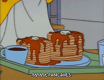 Animated pancakes with text reading, &quot;mmmm pancakes.&quot;