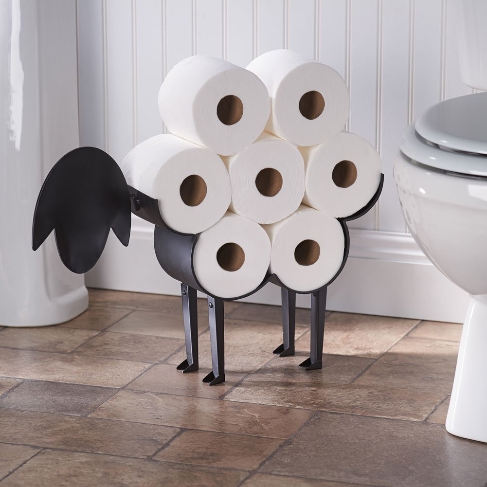 a toilet paper roll holder designed to look like a sheep