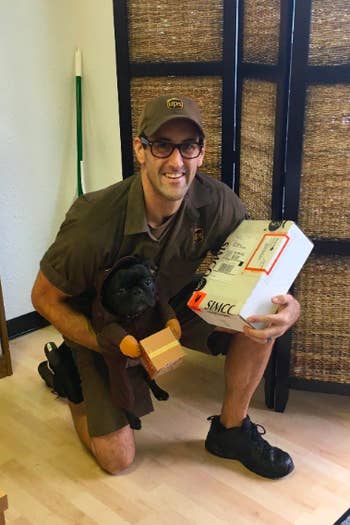 ups driver posing with pug in the costume