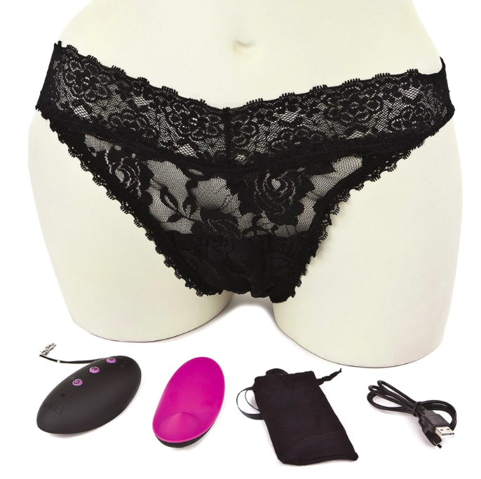 the black lace panties on a mannequin surrounded by the vibrator, remote, case, and charger