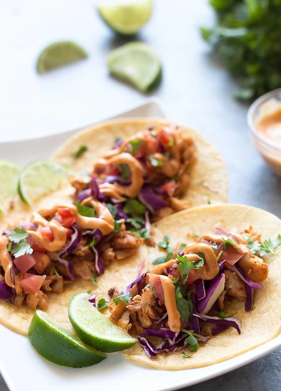 Start with any flaky white fish like cod or halibut, pan-fry it in olive oil, then top it with creamy slaw and a bit of chipotle mayo. Get the recipe here.