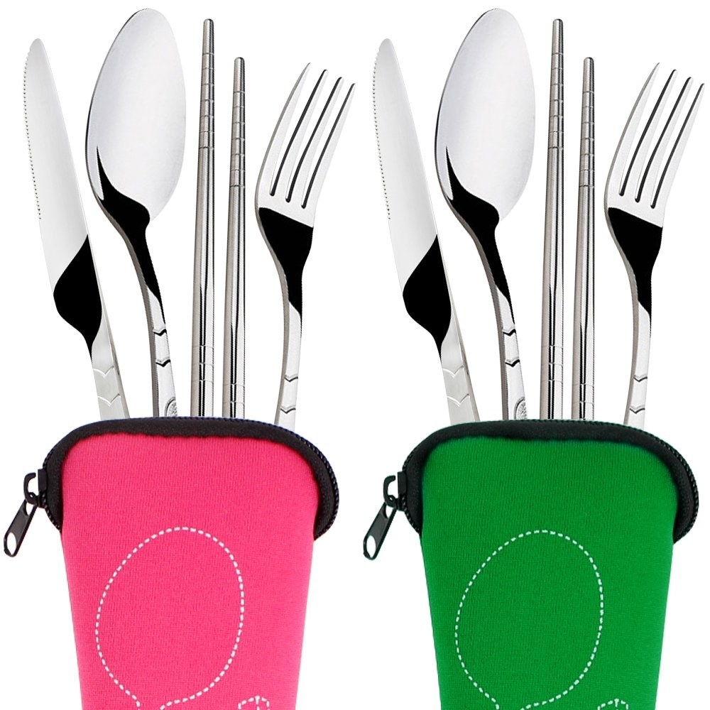 the zip-top bags in pink and green each holding a stainless steel knife, fork, spoon, and pair of chopsticks