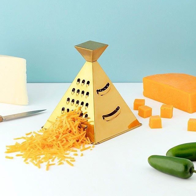 Promising review: "This is a cute little cheese grater. It could double as decor it is so cute. It is small, but efficient if you're shredding cheese table-side or only needing a small amount. It is well suited for medium hardness cheeses. You can grate harder cheese on it, but the available grating spaces are not as ideal for hard cheese. The top has a handy little pyramid on it for holding while grating. This is cute and functional." —Lindsey JaneGet it from Amazon for $24.37.