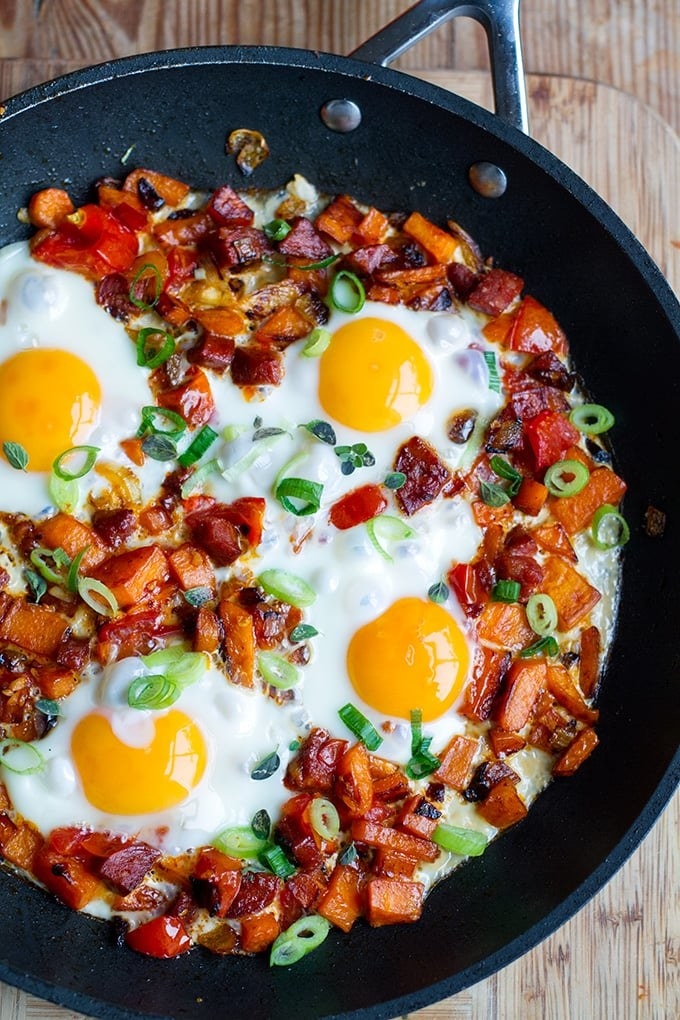 Sweet potato and chorizo crisp up in the skillet to make a perfect base for this hash. You can cook the eggs for as long as you'd like until they reach your desired doneness. Get the recipe here.