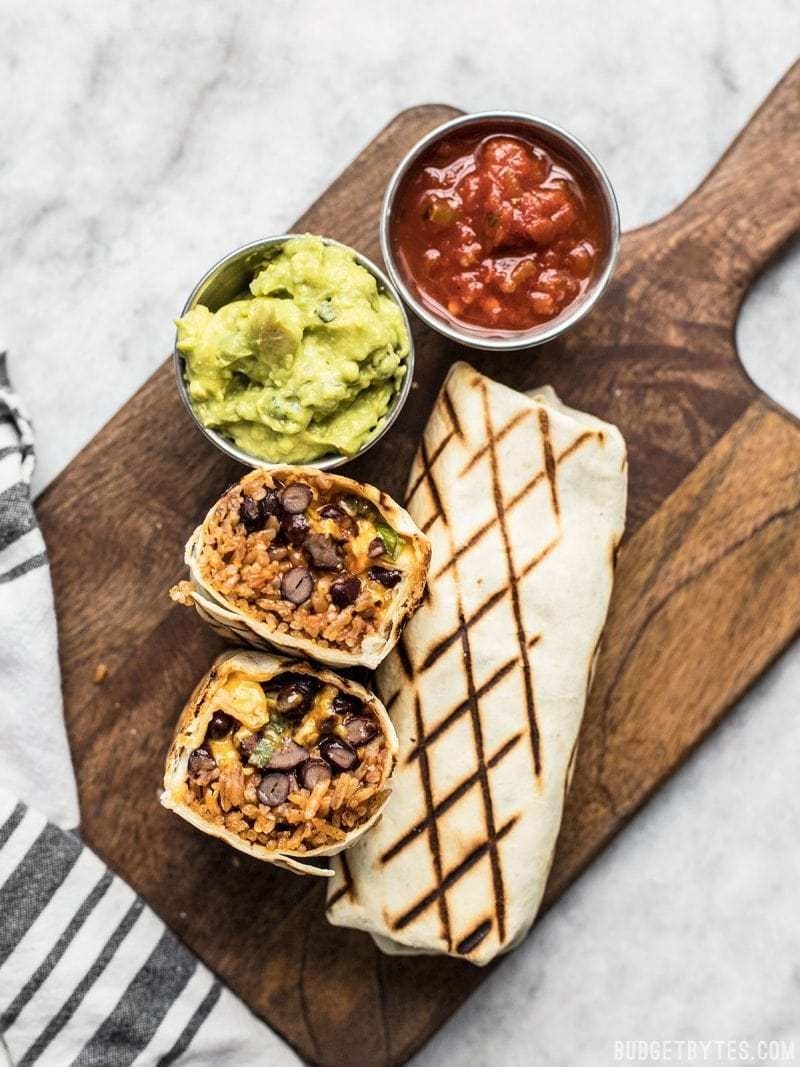 These simple bean and cheese burritos can be assembled ahead of time, placed into Ziploc baggies, and stashed in the freezer for a quick dinner. When you're ready to eat them, just heat them up in the microwave or wrap them in foil and bake in a 350ºF oven for 40 minutes.Estimated recipe cost: $6.93Get the recipe.