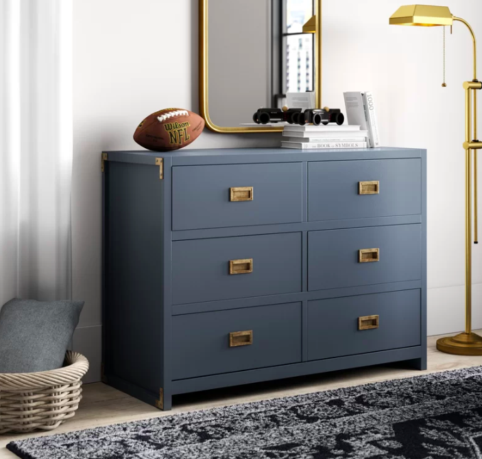 Promising review: "We LOVE our dresser. It’s sturdy, easy to assemble, the drawers are spacious and glide easily, and it is gorgeous in color and detail. It is exactly what we wanted for our twins’ nursery. It could also work in an office, as an accent in a living room, or as an entry way console." —Makinzie Get it from AllModern for $307.99 (originally $719; available in two colors).