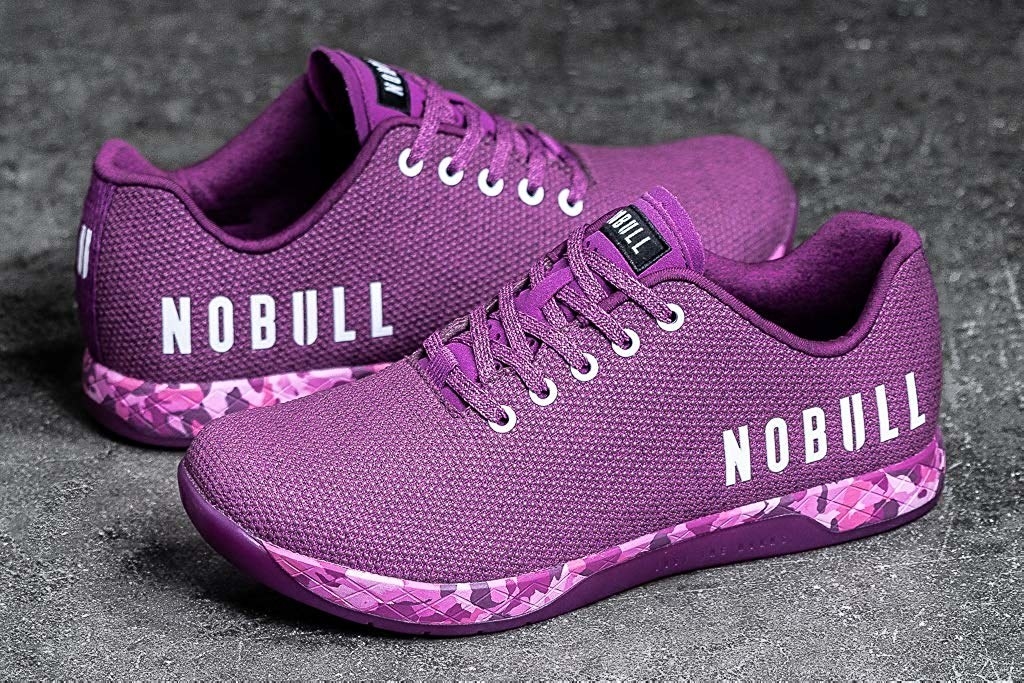 A pair of mesh sneakers with a curved sole and the words &quot;No Bull&quot; on the sides