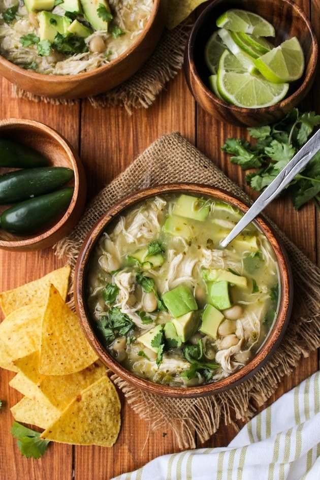 White bean chili with avocado and chips
