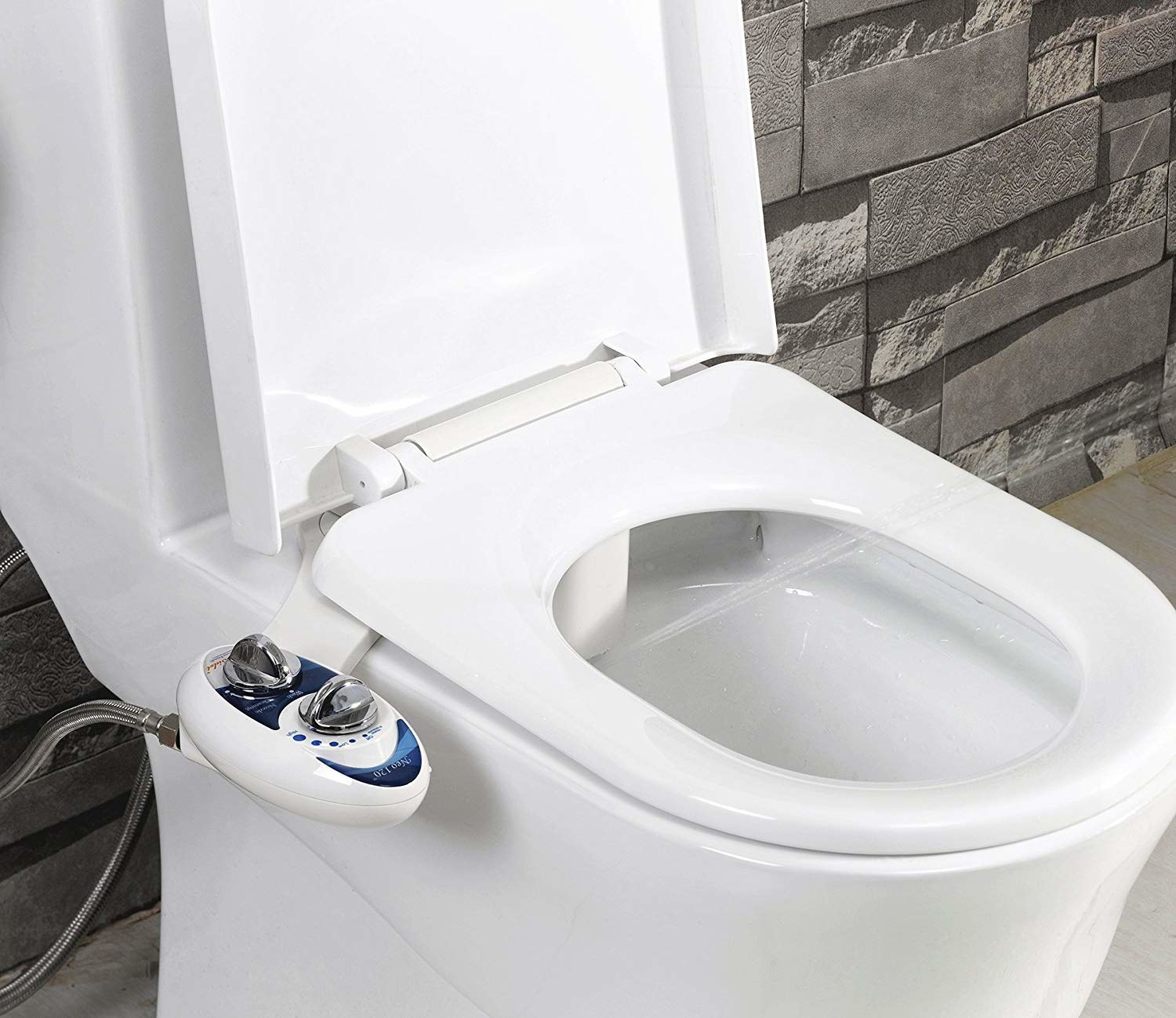 bidet with small dial attached to toilet