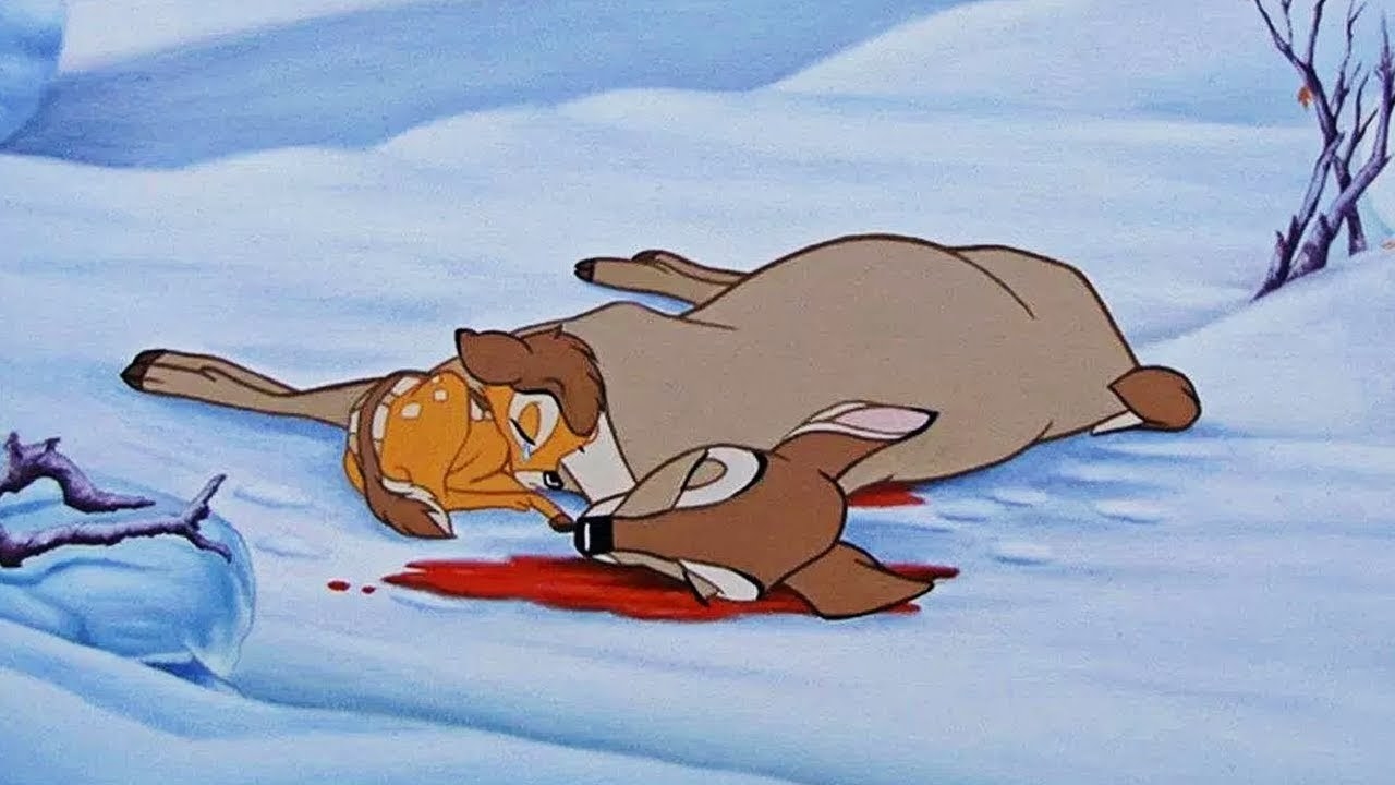 bambi curled up crying in the snow next to his mum who&#x27;s bleeding out