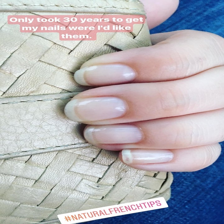 reviewer's instagram story of healthy-looking nails that reads "only took 30 years to get my nails where I'd like them, hashtag natural french tips"
