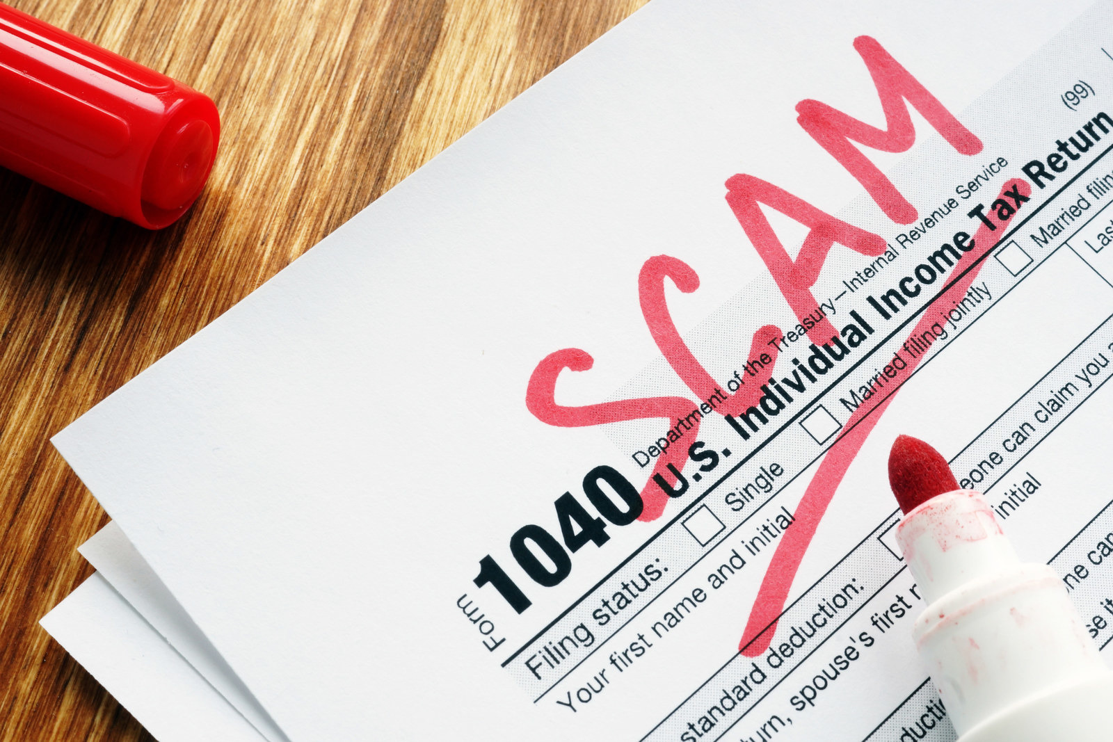 A good rule of thumb for bureaucracies like the IRS: They're not going to call you on the phone! Even if the caller ID says it's them. If you get a call from a person or robot saying they're "with the IRS" and they're putting a warrant out for your arrest because of taxes you owe, or making some other immediate threat, unless you pay them right then and there on the phone, that's not our beloved government entity calling! The IRS has months of processing and committees and auditors and paperwork and envelopes for stuff like that. Hang up, and go call an accountant instead.If you're still not sure if something’s legit, check out these five ways to spot a tax scam from the IRS itself. And if you want to see what it takes to actually get charged with a crime of tax evasion, see more here.