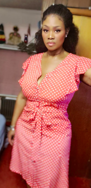 reviewer wearing the dress