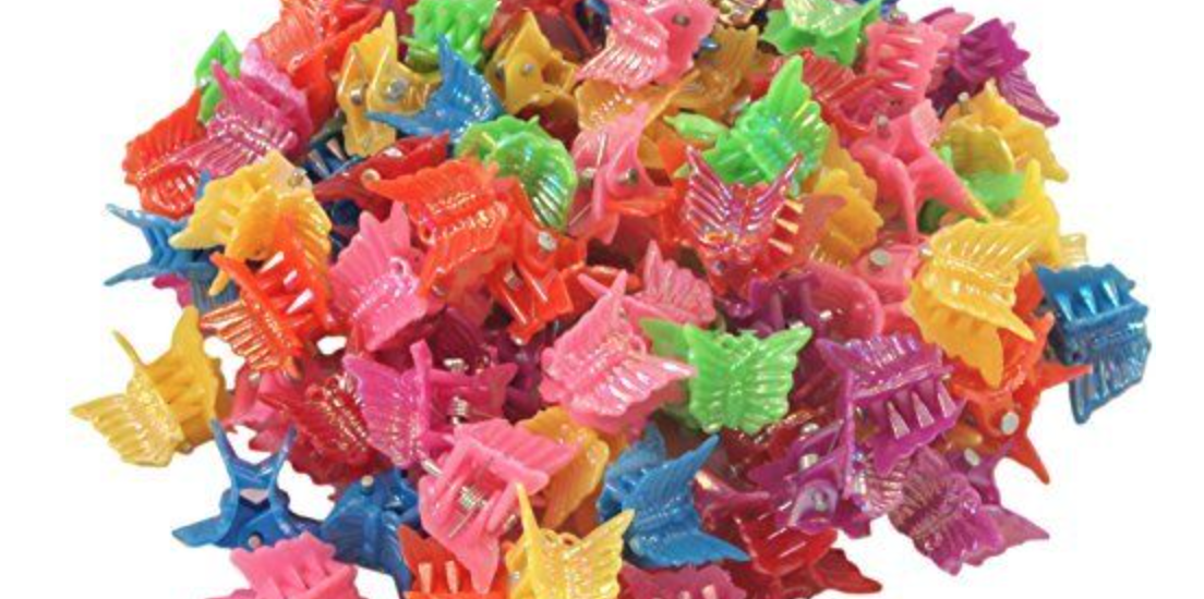 A pile of different color plastic butterfly hair clips