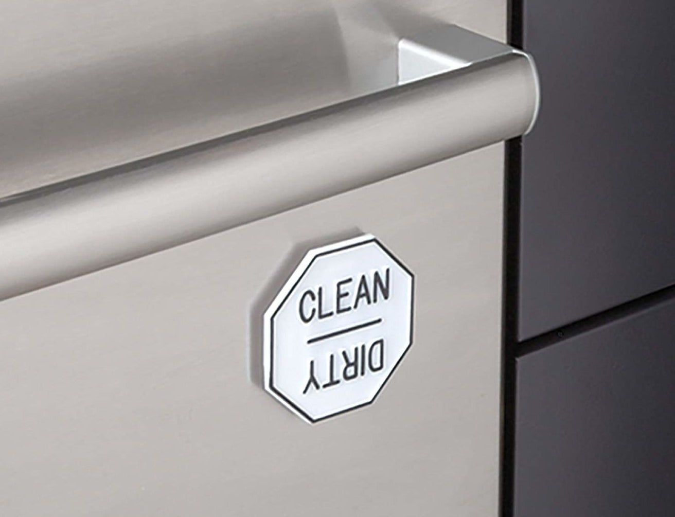 A dishwasher magnet with &quot;clean&quot; side facing up