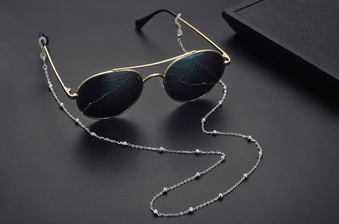 Sunglasses with the chain attached to the arms