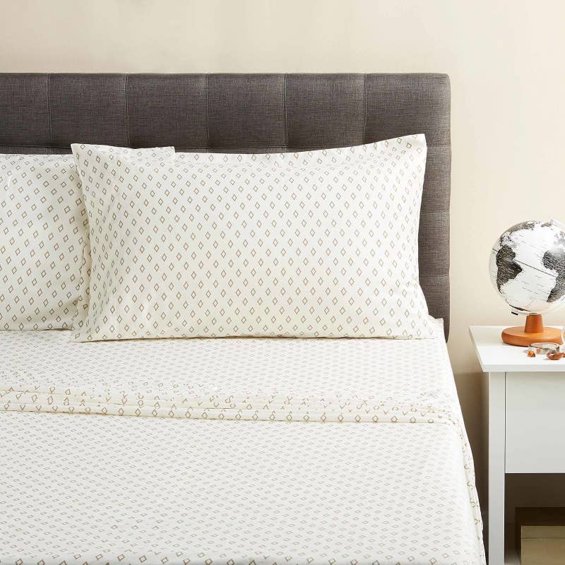 Incudes a flat sheet, fitted sheet, and one pillow case. Promising review: "I find these sheets delightful! I bought the coral; the color is more orange than in the picture but the fabric is really nice. It feels and looks like sateen and goes very well with my decor." —JaninVAPrice: .83+ (available in 24 colors and four sizes)