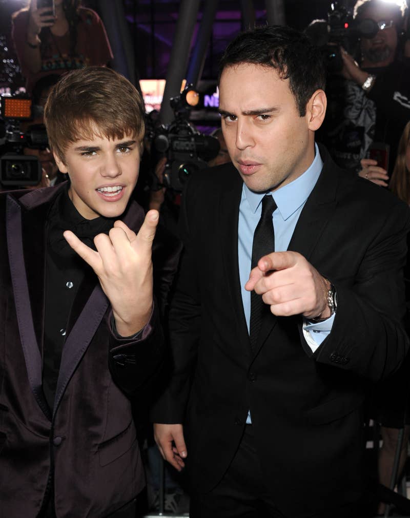 Justin Bieber, left, and manager Scooter Braun at the premiere of the Justin Bieber: Never Say Never Tour in 2011.