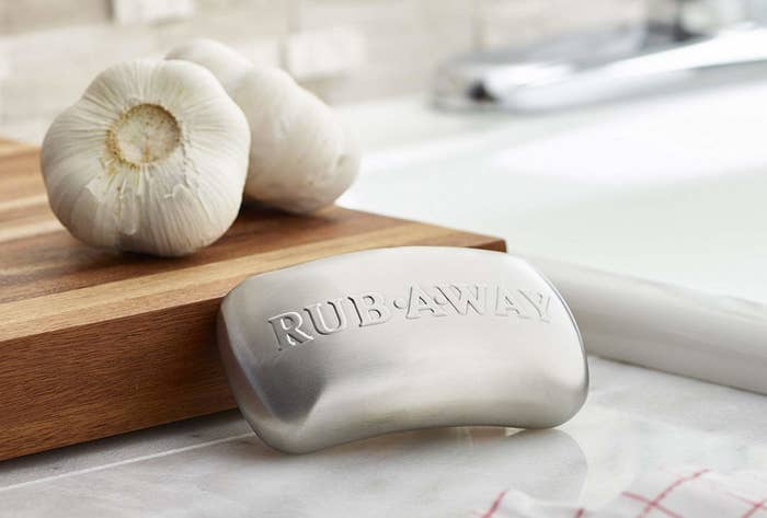 The soap bar-shaped stainless steel, with the text &quot;rub away&quot; on it