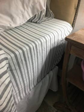 same reviewer's pic of the fitted sheet on the mattress like it's supposed to be