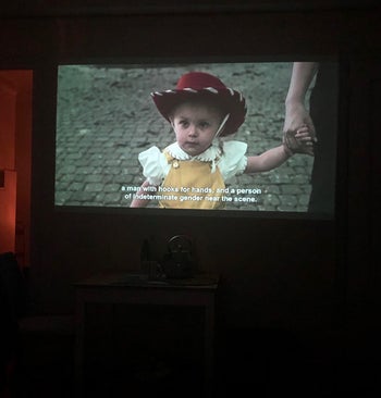 The projected image in a dark room, which is large and relatively clear 