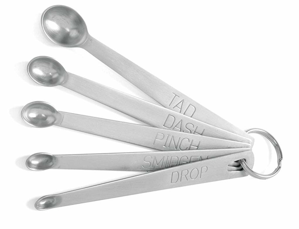 The set of drop, smidgen, pinch, dash, and tad measuring spoons