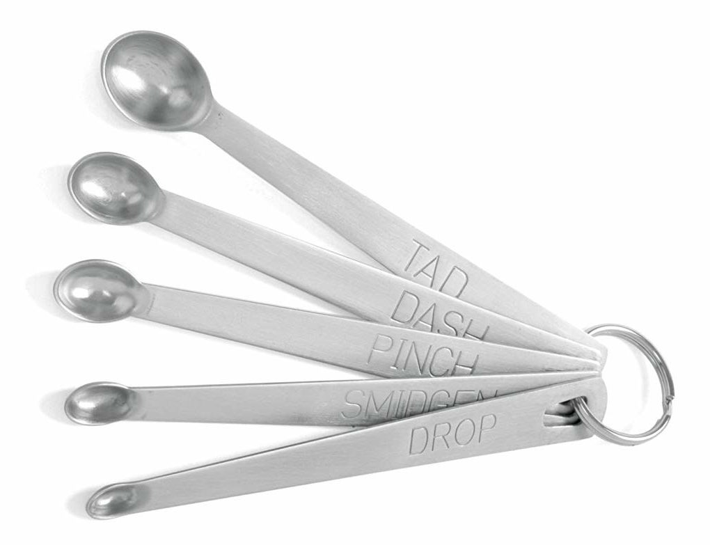 The set of drop, smidgen, pinch, dash, and tad measuring spoons