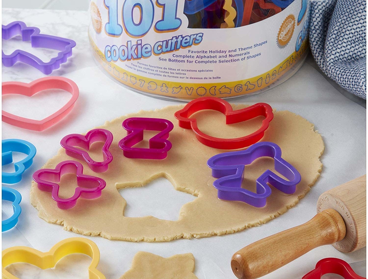 The cookie cutter set in various shapes and colors