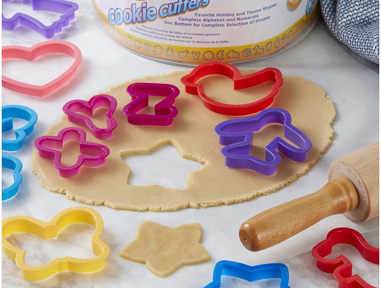 The cookie cutter set in various shapes and colors