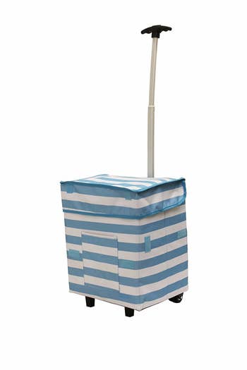 square shaped shopping bag with a front pocket on wheels with a long handle for pulling