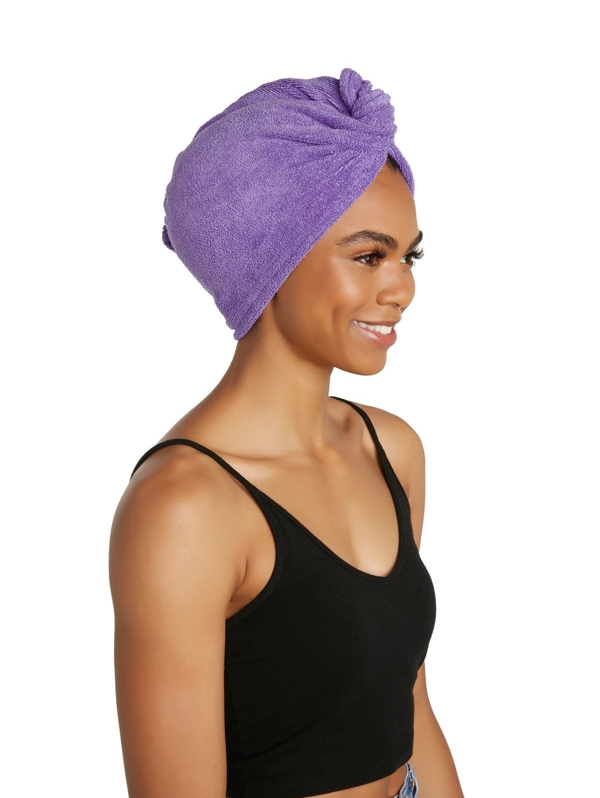 person wearing the turbie twist on head while wearing clothes