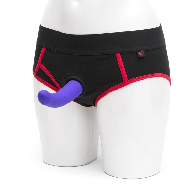 Same harness briefs with a purple dildo on a mannequin