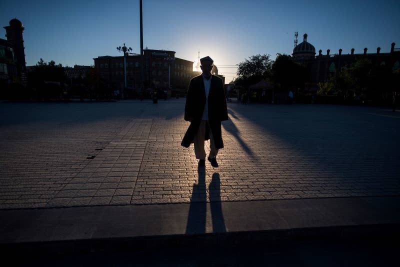 A Muslim man arrives at the Id Kah Mosque for the morning prayer on Eid al-Fitr in the old town of Kashgar in Xinjiang, June 2017.